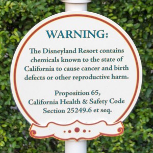 1280px-Disneyland_Prop_65_Warning_crop.jpg